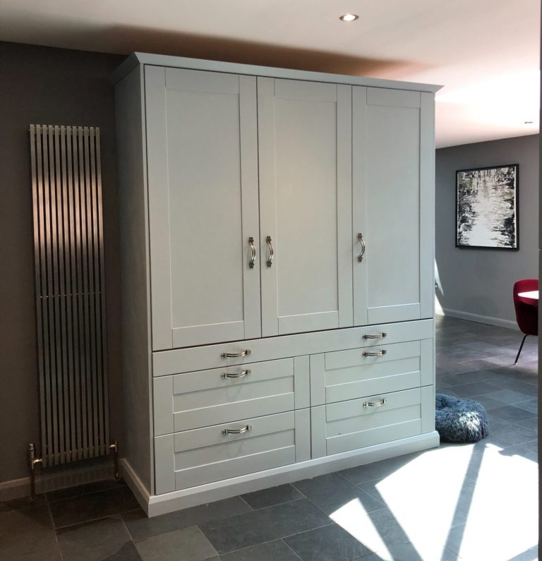 Custom made kitchen dresser made from Birch ply with MDF Shaker-style doors, matching existing kitchen.  Complete with pull out heavy duty shelf/table top.