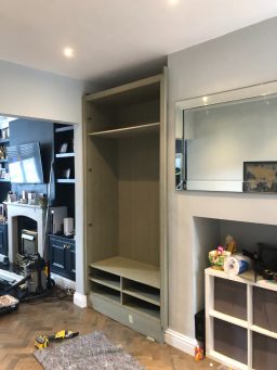 Beautiful downstairs fitted wardrobe, hand-crafted to home coats and shoes.  Moisture resistant MDF with shaker-style paneled doors. Cornice and Skirting to compliment existing decorations.